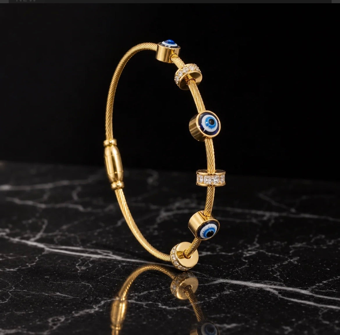 Golden evil eye charm bracelet