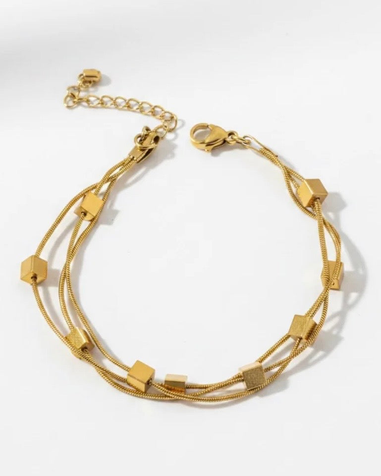 Triple strand gold cube bracelet