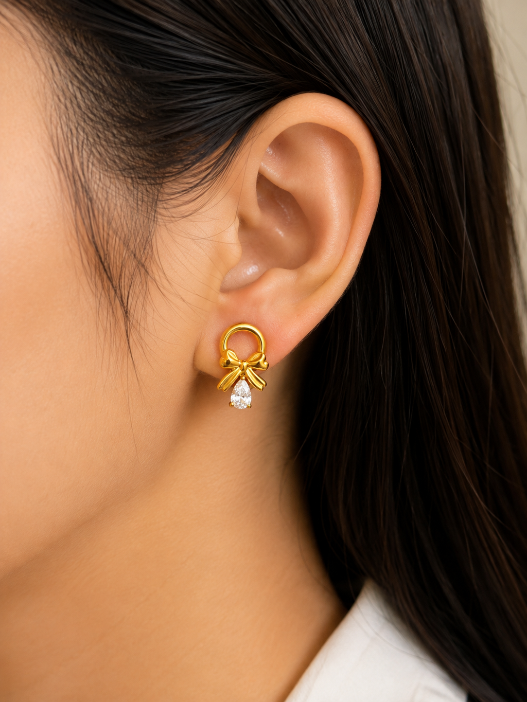 Golden Bow teardrop earring